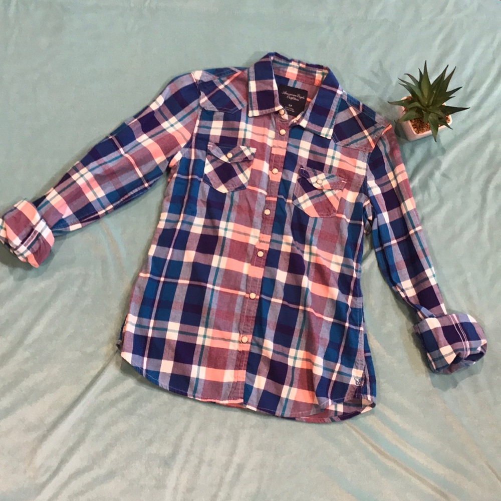Women's flannel plaid pearl snapped top